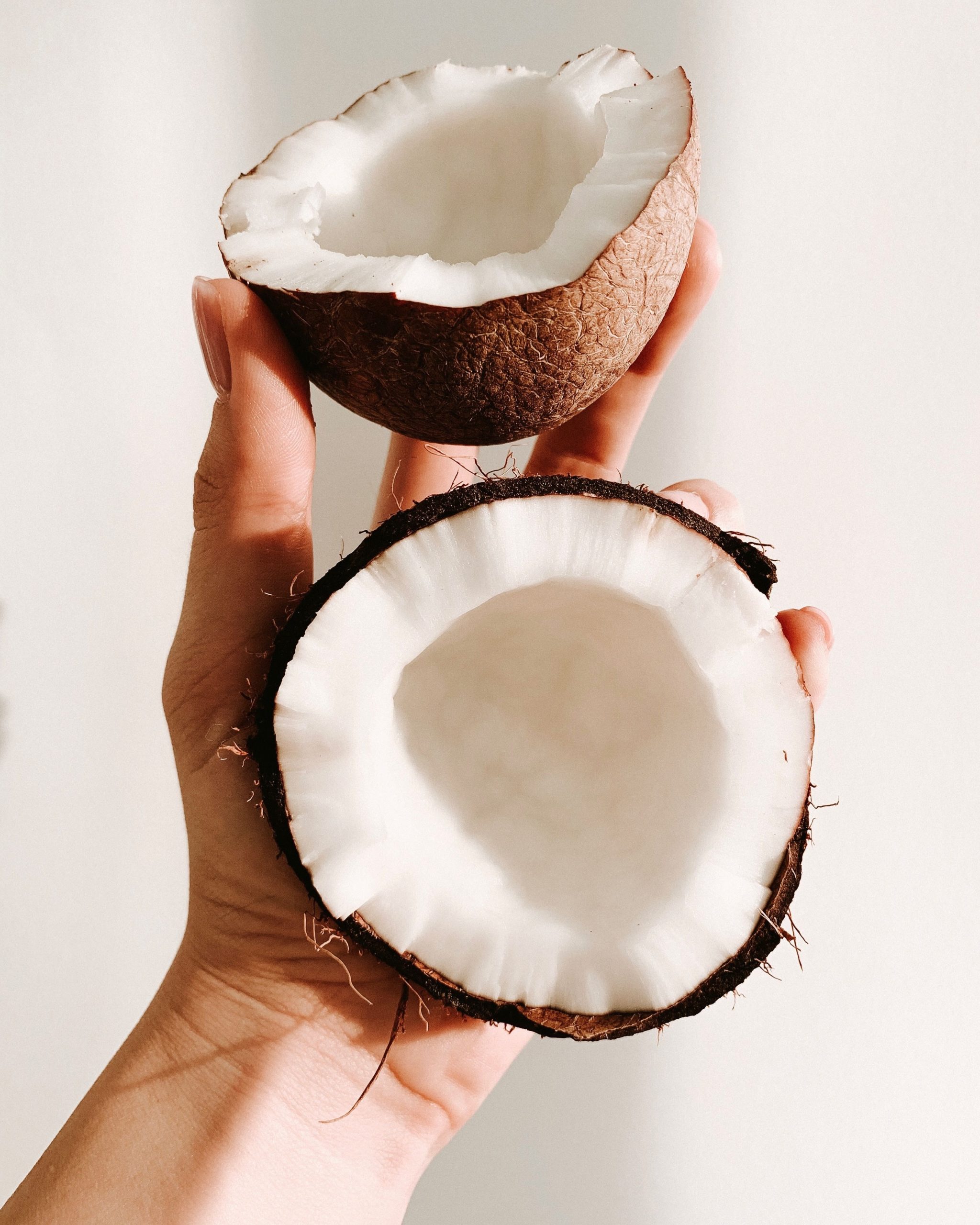 coconuts in hands