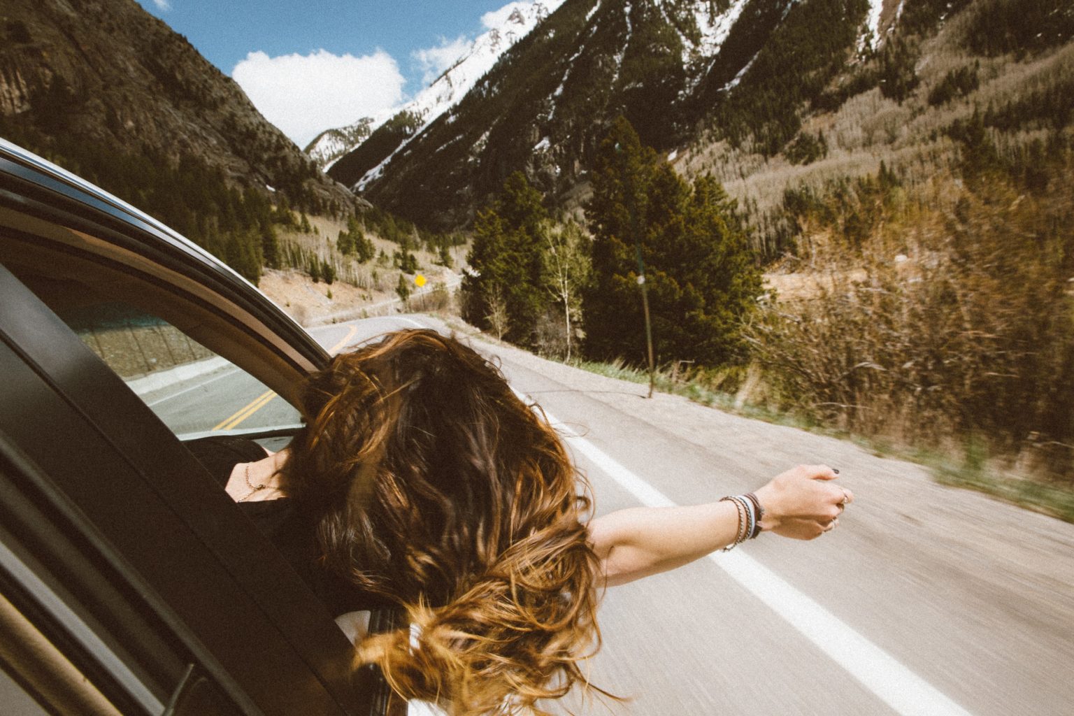 woman enjoying a drive