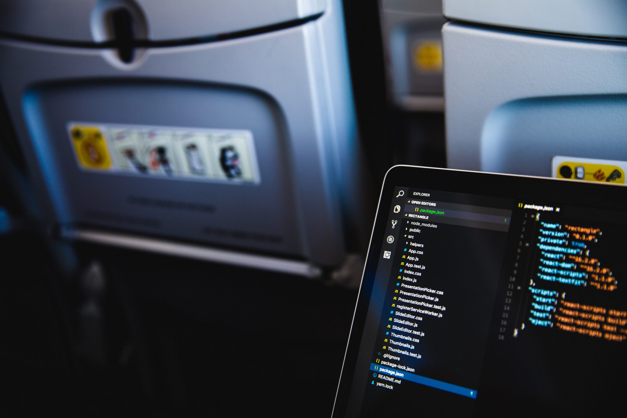 person working remotely on plane